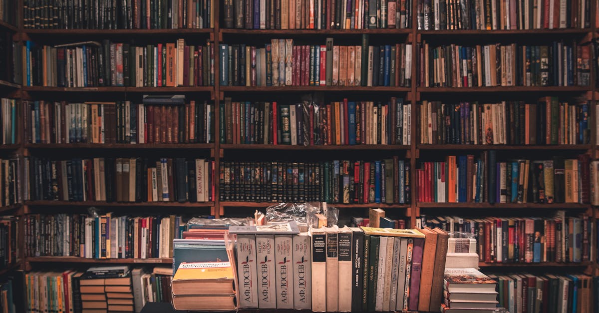 A tranquil library filled with books on wooden shelves, offering a warm, inviting atmosphere.